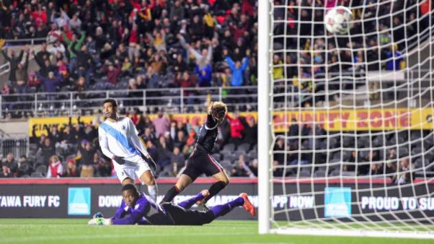 Tom Heinemann of Ottawa Fury FC Scores against Minnesota United in Extra Time