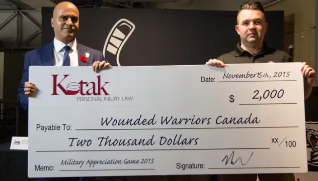 Kotak Law Presents Check to Wounded Warriors Canada