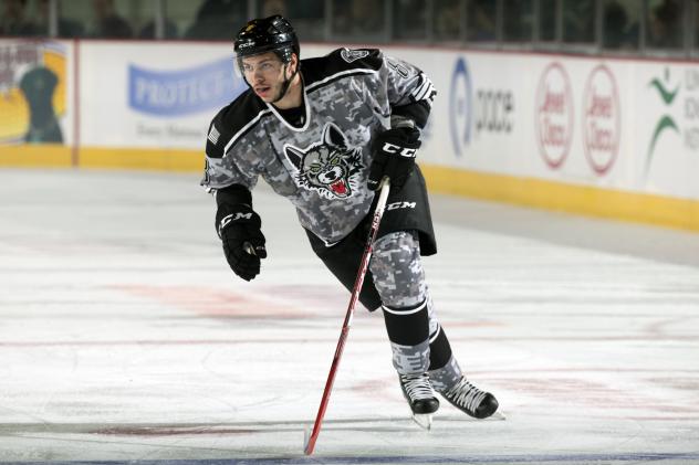 Ty Rattie of the Chicago Wolves Skates against the Grand Rapids Griffins