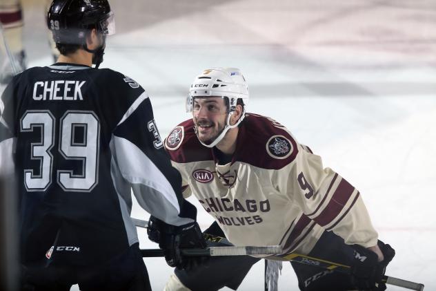 Chicago Wolves Center Justin Hodgman Faces off with the San Antonio Rampage
