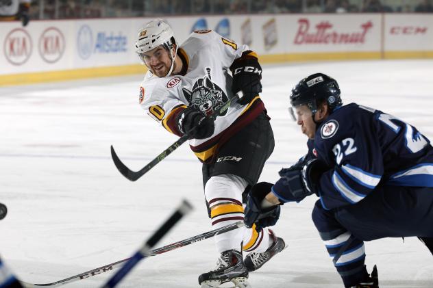 Chicago Wolves RW Zach O'Brien Shoots against the Manitoba Moose