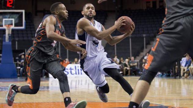 Halifax Hurricanes Guard Justin Johnson Drives to the Hoop