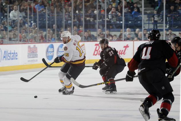 Chicago Wolves C Jeremy Welsh Controls the Puck vs. the Lake Erie Monsters