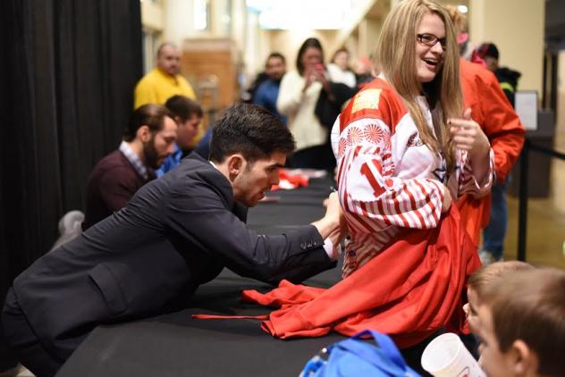 Danny Federico of the Allen Americans Provides an Autograph for a Fan