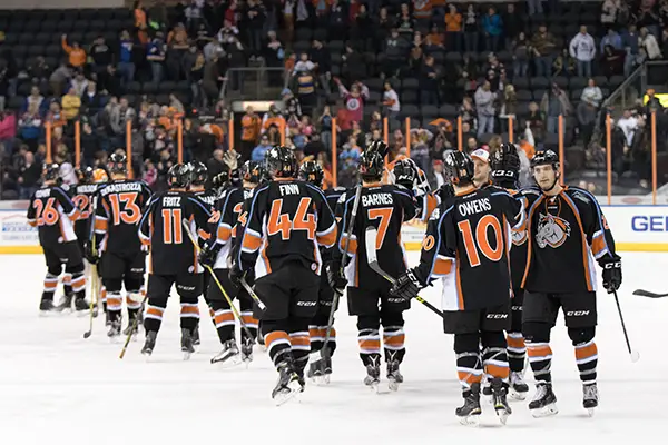 Missouri Mavericks Exchange Congratulations after Win over the Evansville IceMen