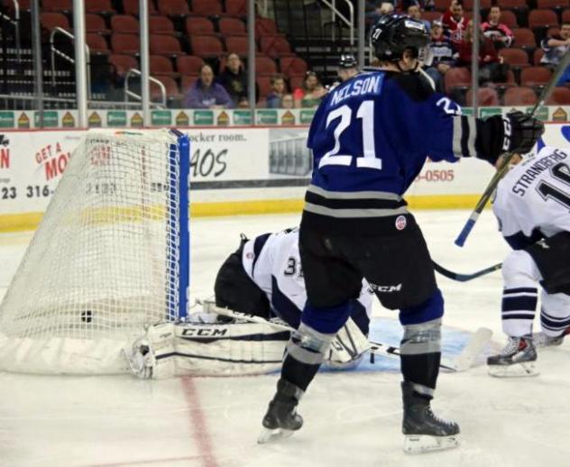 Logan Nelson of the Wichita Thunder Celebrates a Goal in Front of the Evansville IceMen