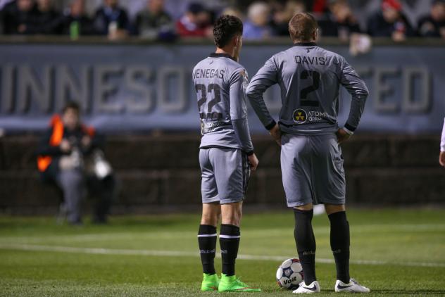 Defenders Justin Davis and Kevin Venegas of Minnesota United FC