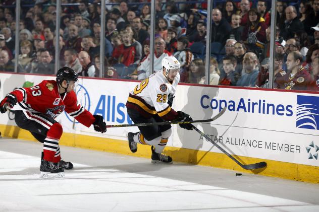 Chicago Wolves RW Danny Kristo Controls the Puck vs. the Rockford IceHogs