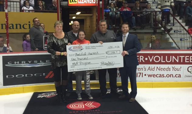 Unifor Local 444 and the Windsor Spitfires Present a Check to Plentiful Harvest