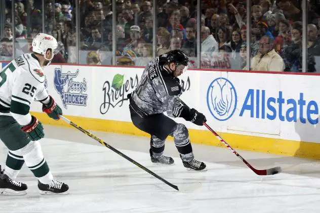 Chicago Wolves RW Ty Rattie Controls the Puck vs. the Iowa Wild