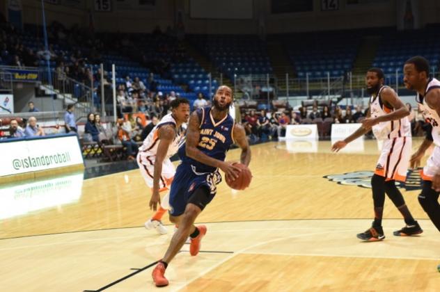 Saint John Mill Rats Forward Gabe Freeman Drives to the Basket against the Island Storm