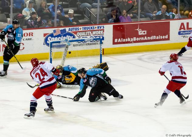 Spencer Asuchak of the Allen Americans Scores against the Alaska Aces