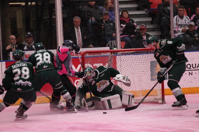 Tri-City Americans Attack the Everett Silvertips Net on Pink Ice