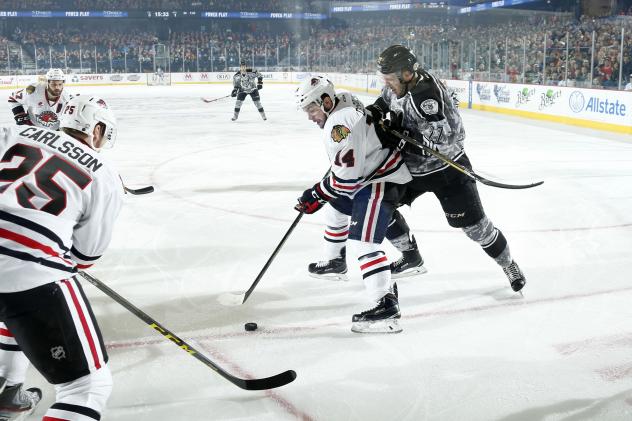 Chicago Wolves RW Jordan Caron Battles the Rockford IceHogs