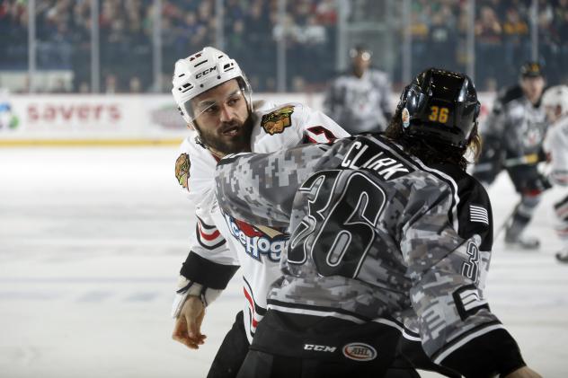 Chicago Wolves LW Emerson Clark vs. Michael Liambas of the Rockford IceHogs