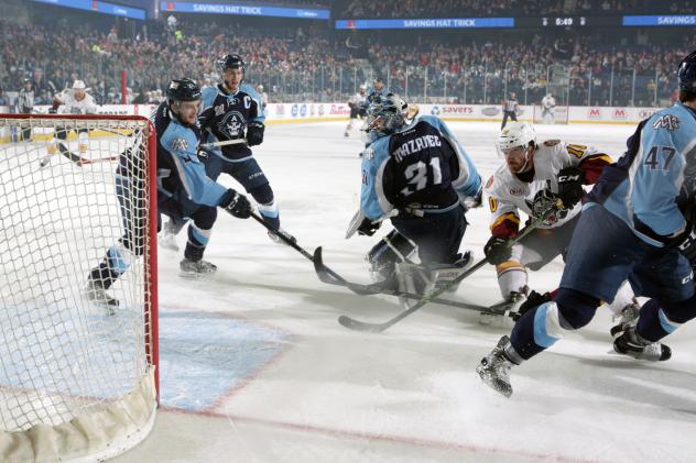 Chicago Wolves RW Zach O'Brien Fights for a Score vs. the Milwaukee Admirals