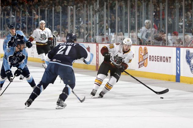 Chicago Wolves LW Emerson Clark with the Puck vs. the Milwaukee Admirals