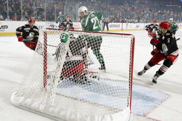 Chicago Wolves RW Jordan Caron in from of the Grand Rapids Griffins Net