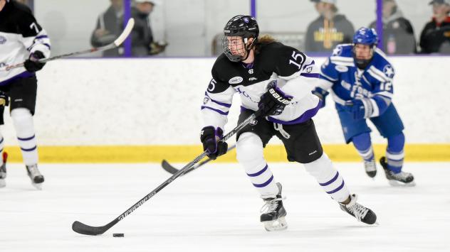 Forward Castan Sommer with the College of the Holy Cross