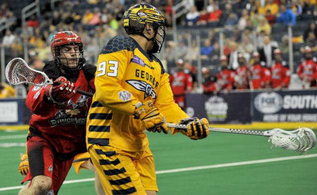 Johnny Powless of the Georgia Swarm vs. the Calgary Roughnecks
