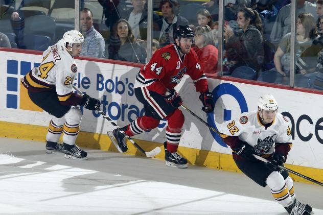 Chicago Wolves D Jordan Schmaltz (24) and C Ivan Barbashev vs. the Rockford IceHogs