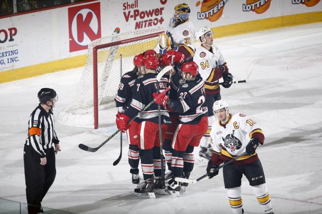 Chicago Wolves Watch the Grand Rapids Griffins Celebrate a Goal