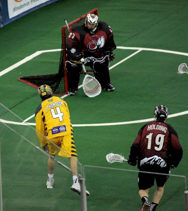 Lyle Thompson of the Georgia Swarm Takes a Shot on the Colorado Mammoth Goal