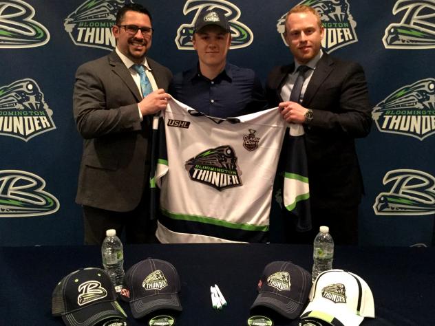 Bloomington Thunder Official Present Forward Calen Kiefiuk with his Jersey