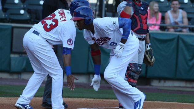 Domonic Brown of the Buffalo Bisons Congratulated by Dalton Pompey