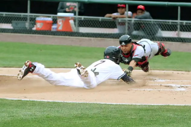 Trea Turner of the Syracuse Chiefs Slides in Safely for a Run vs. the Rochester Red Wings