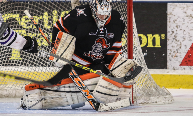 Omaha Lancers Goaltender Zackarias Skog Blocks a Shot