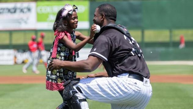 US Captain Gerald Eady, Disguised as a Kannapolis Intimidators Catcher, Surprises his Daughter