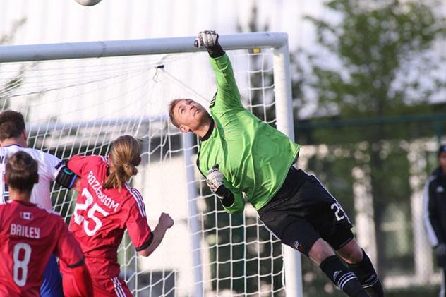 James Bailey and Lance Rozeboom of Ottawa Fury FC Test the Edmonton FC Goaltender