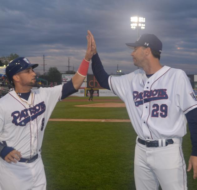 Somerset Patriots INF David Vidal and Manager Brett Jodie Exchange High Fives