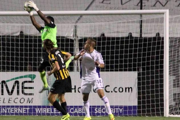 Charleston Battery Goalkeeper Odisnel Cooper catches a Louisville City FC Shot on September 12, 2015