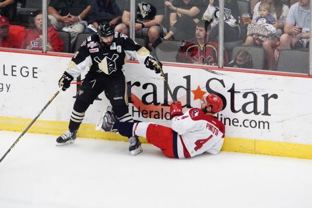 Rick Pinkston of the Allen Americans Slides into the Boards vs. the Wheeling Nailers
