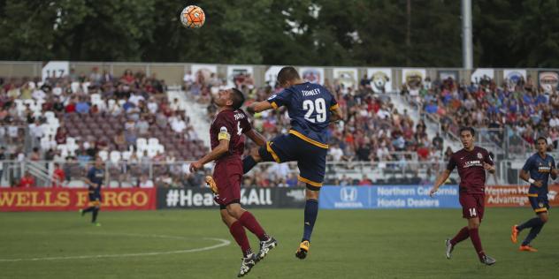 Sacramento Republic FC and LA Galaxy II Battle for a High Ball