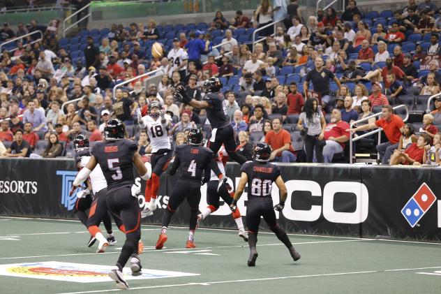 Orlando Predators LB Terence Moore Leaps High for a Ball