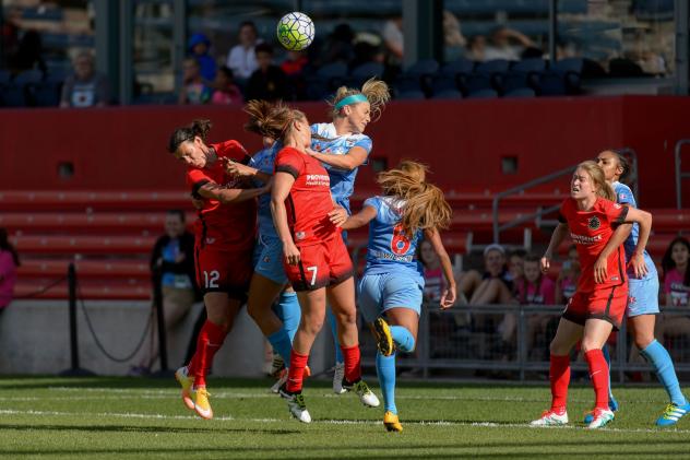 Chicago Red Stars and Portland Thorns Battle for Possession