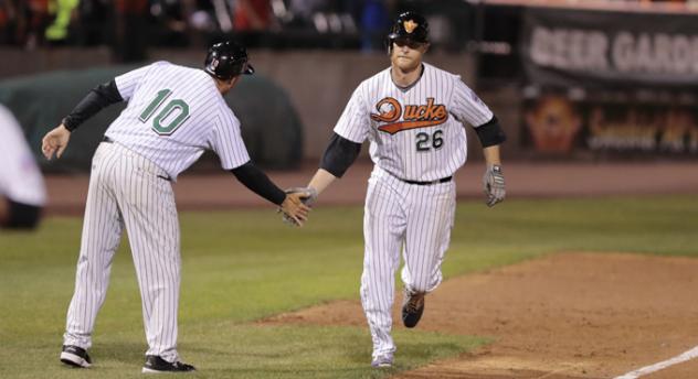 Dan Johnson of the Long Island Ducks Congratulated after Homering