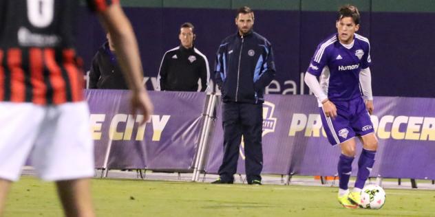 Arizona United Defender Adam West with Louisville City FC