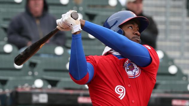 Domonic Brown had a hit in both of Tuesday's games to extend his hitting streak to 12 games.