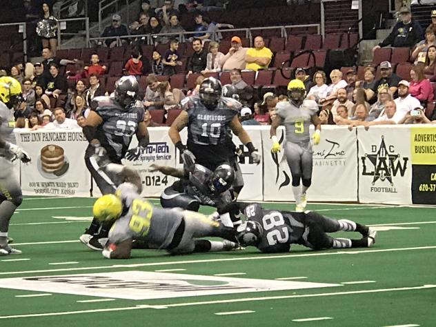 NEWS Gladiators Fall by Inches against the Law, Lose 59-52