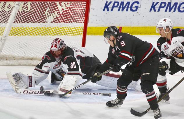 Vancouver Giants Goaltender David Tendeck stops a Red Deer Rebels' scoring attempt