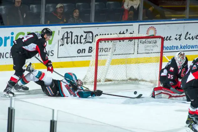 Prince George Cougars defense desperately fights off the Kelowna Rockets