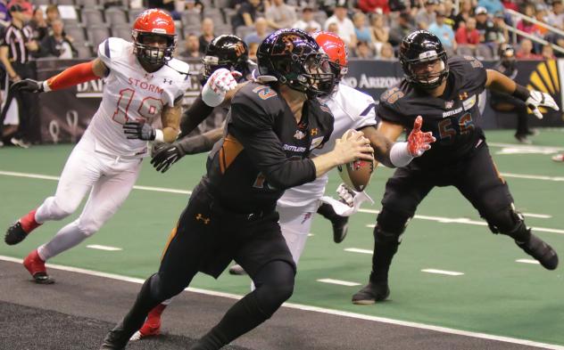 Arizona Rattlers Quarterback Jeff Ziemba avoids pressure from the Sioux Falls Storm