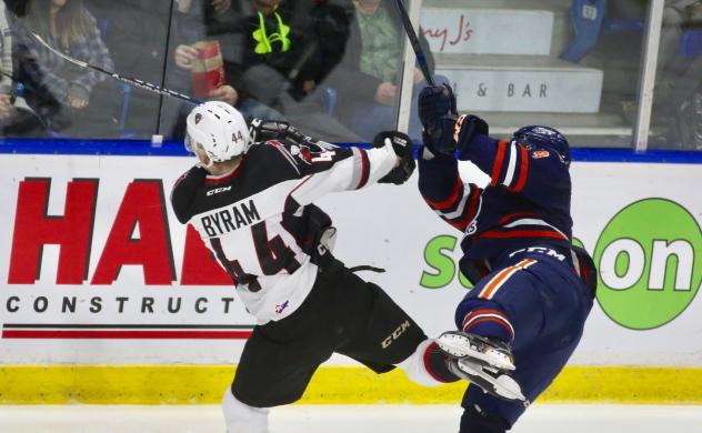 Vancouver Giants Defenseman Bowen Byram collides with a Kamloops Blazer