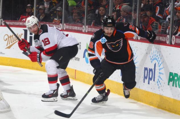 Lehigh Valley Phantoms Forward Phil Varone races to the puck against the Binghamton Devils