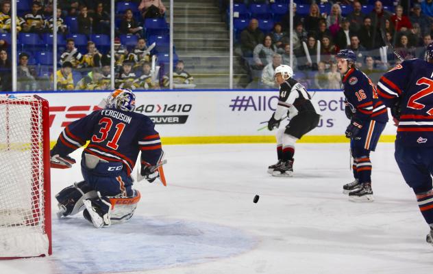 Vancouver Giants Alex Kannok Leipert shoots at the Kamloops Blazers goal