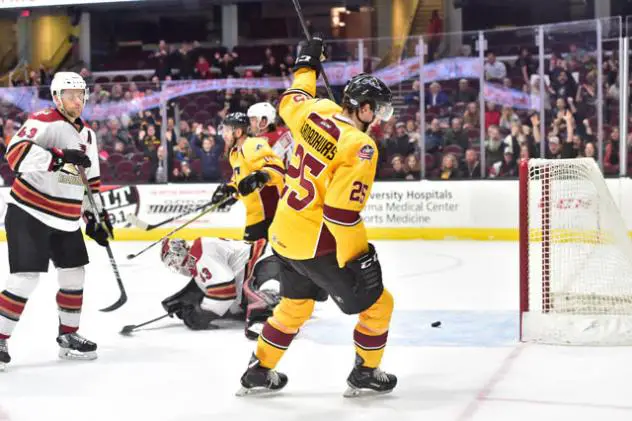 Cleveland Monsters Center Alex Broadhurst celebrates a Cleveland goal